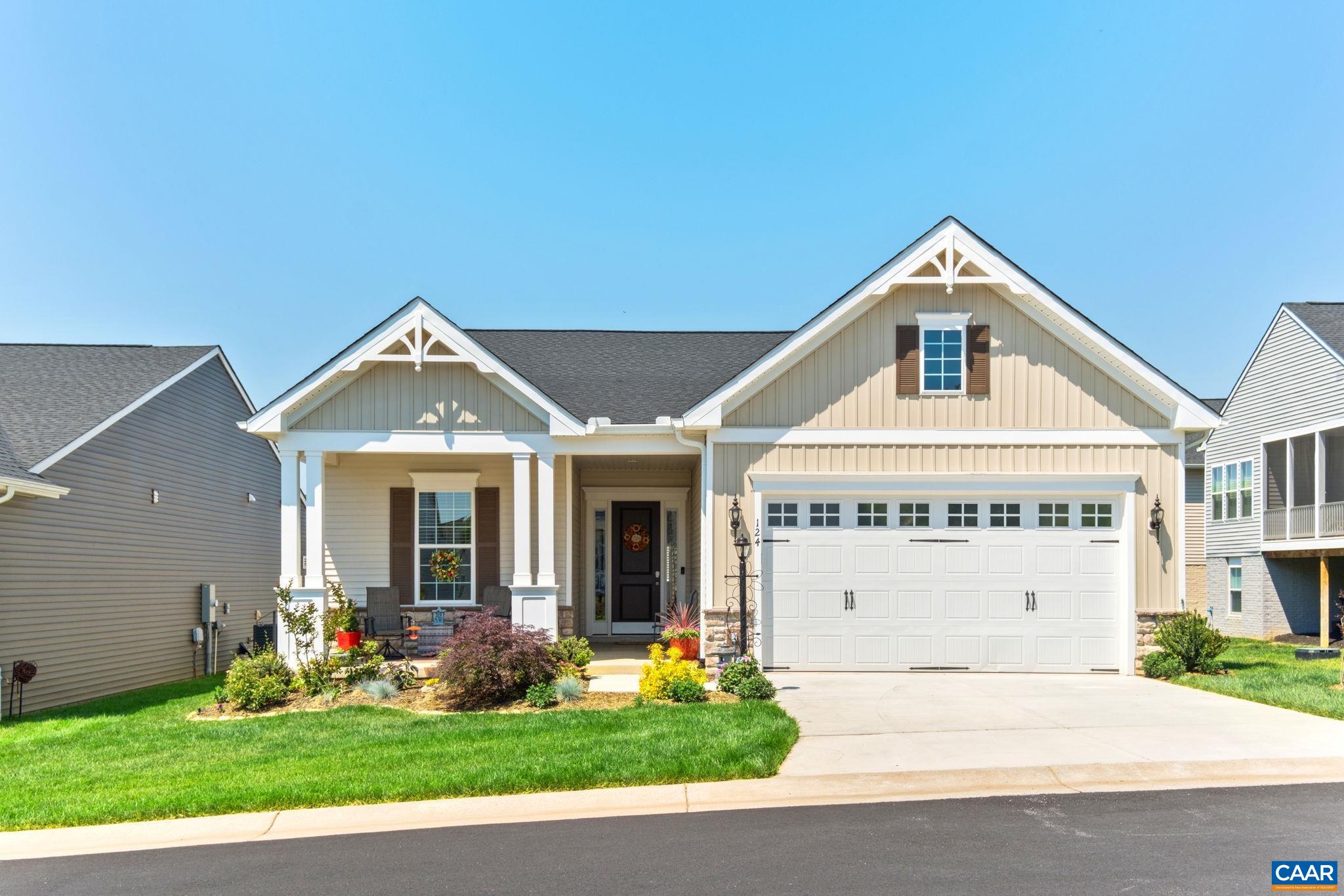 124 Stodghill Drive Ruckersville, VA 22968 - Photo 2 of 58 a front view of a house with garden