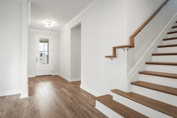 a view of entryway with wooden floor