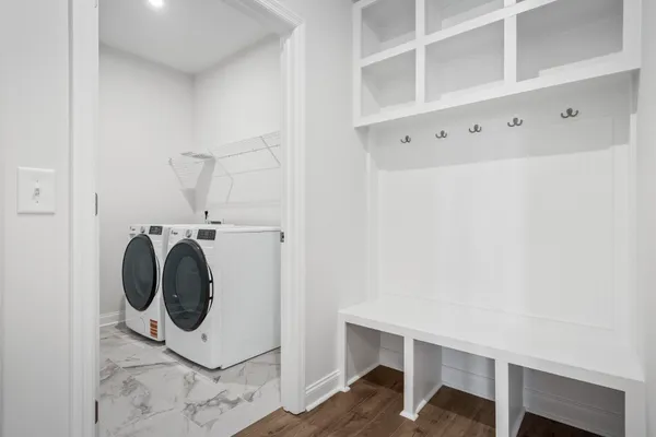 a utility room with dryer and washer