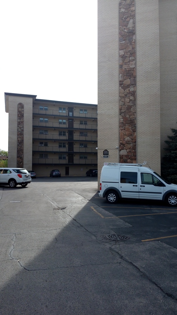 Undisclosed Address Chicago, IL 60630 - Photo 14 of 15 a view of car parked in garage