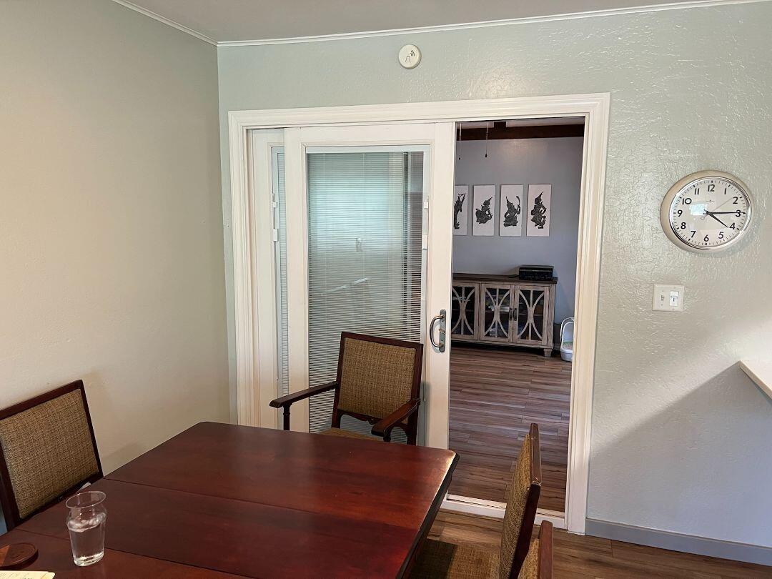 9733 Hidden Lane Palo Cedro, CA 96073 - Photo 12 of 63 a view of a hallway with wooden floor