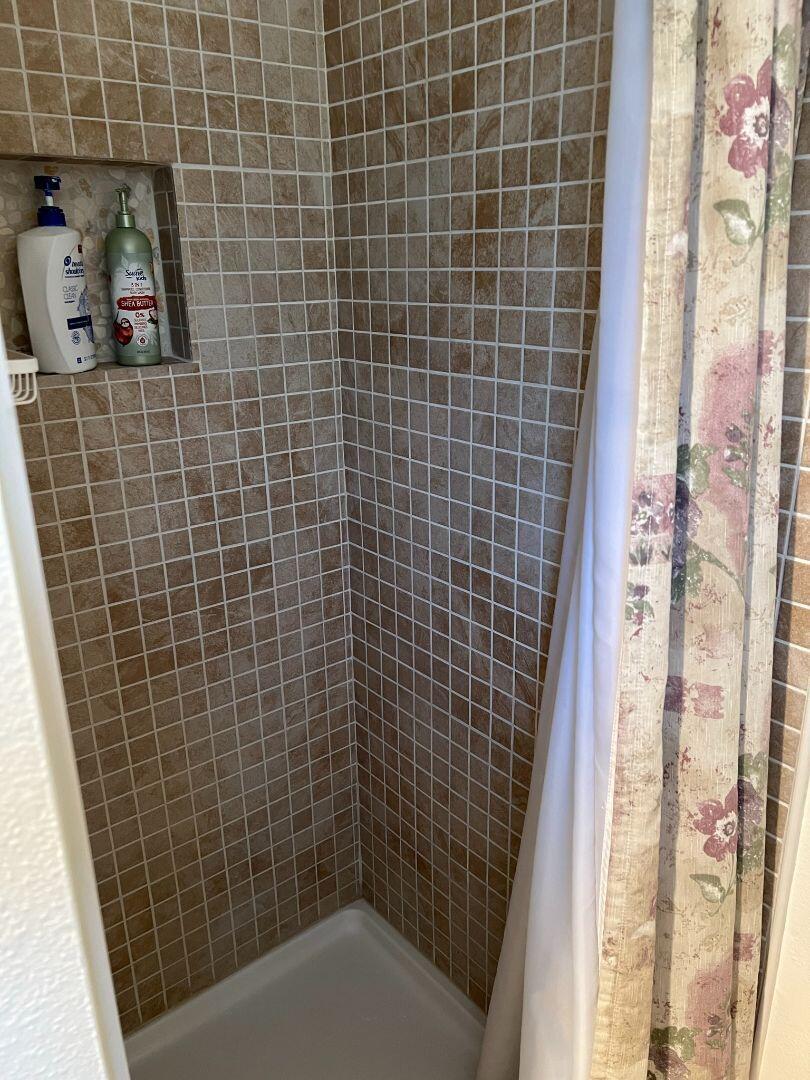 9733 Hidden Lane Palo Cedro, CA 96073 - Photo 28 of 63 a bathroom with a shower