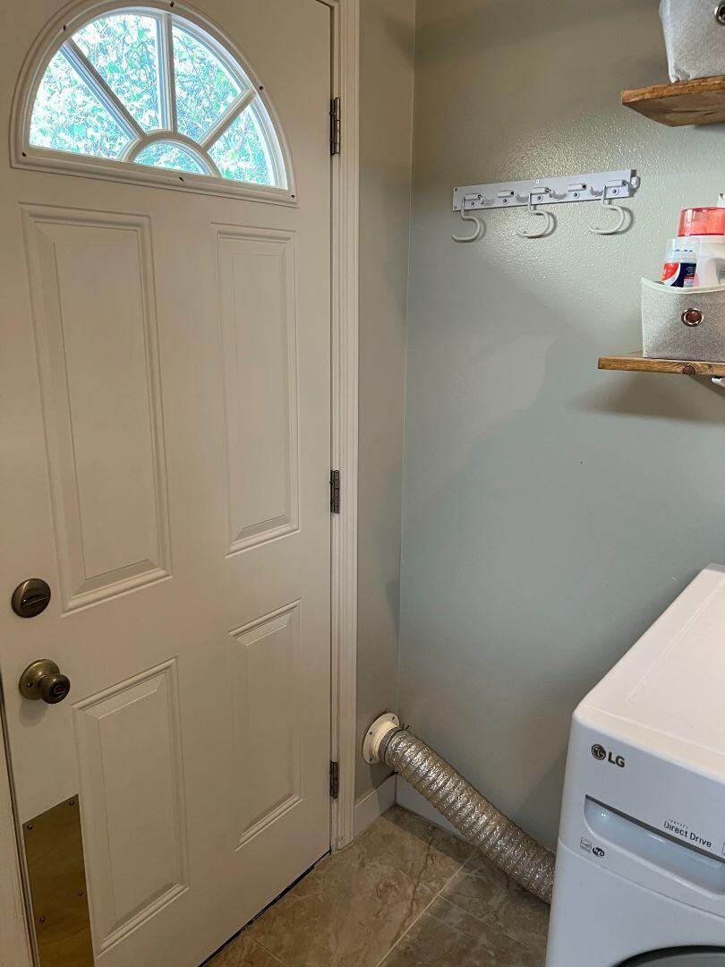 9733 Hidden Lane Palo Cedro, CA 96073 - Photo 30 of 63 a bathroom with a window and a shower