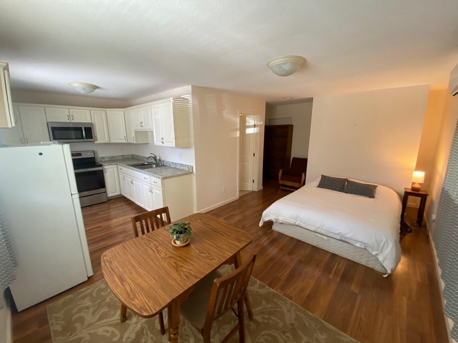 9733 Hidden Lane Palo Cedro, CA 96073 - Photo 55 of 63 a living room with a couch and a table