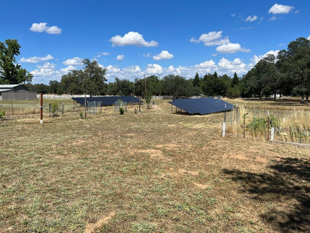 9733 Hidden Lane Palo Cedro, CA 96073 - Photo 61 of 63 a backyard of a house with lots of green space