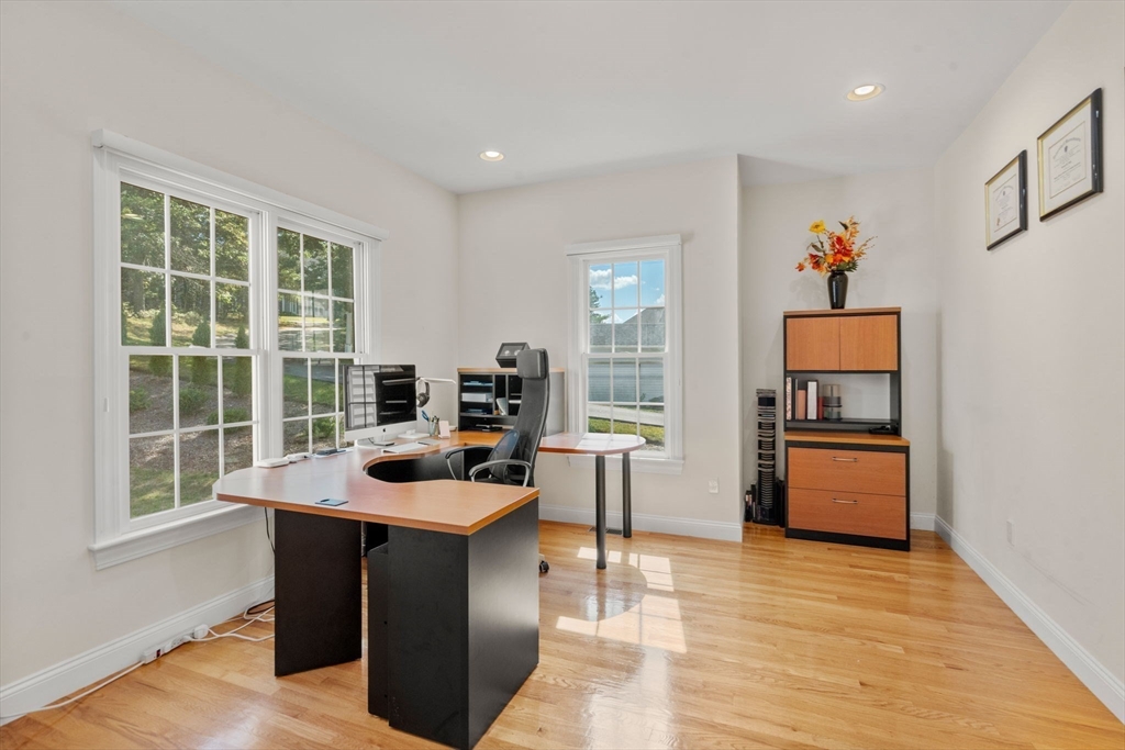 21 Whispering Lane Natick, MA 01760 - Photo 16 of 41 a living room with furniture and a window