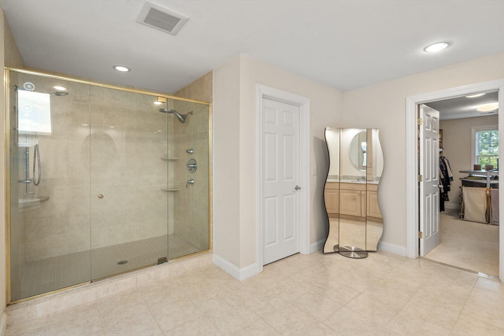 21 Whispering Lane Natick, MA 01760 - Photo 22 of 41 a view of empty room with wooden floor