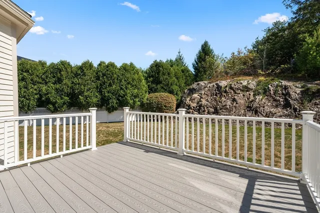 a view of a wooden roof deck