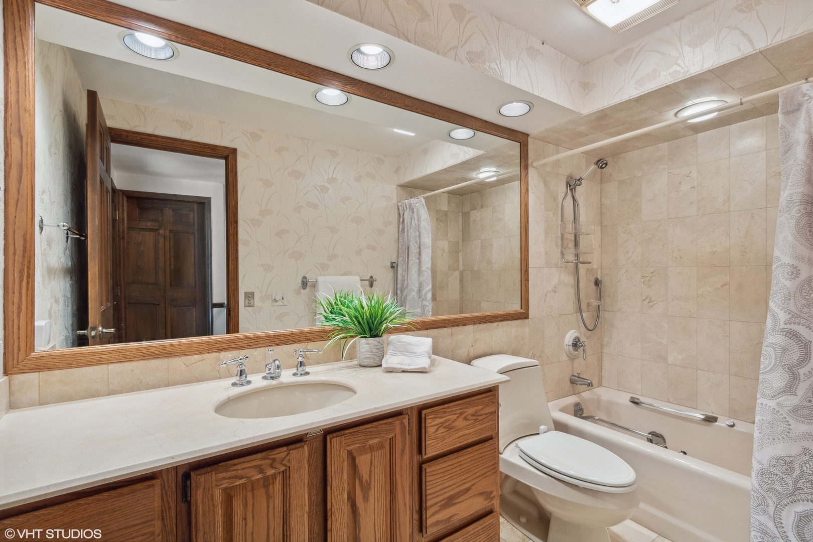 322 Old Sutton Road Barrington, IL 60010 - Photo 20 of 37 a bathroom with a double vanity sink toilet mirror and shower