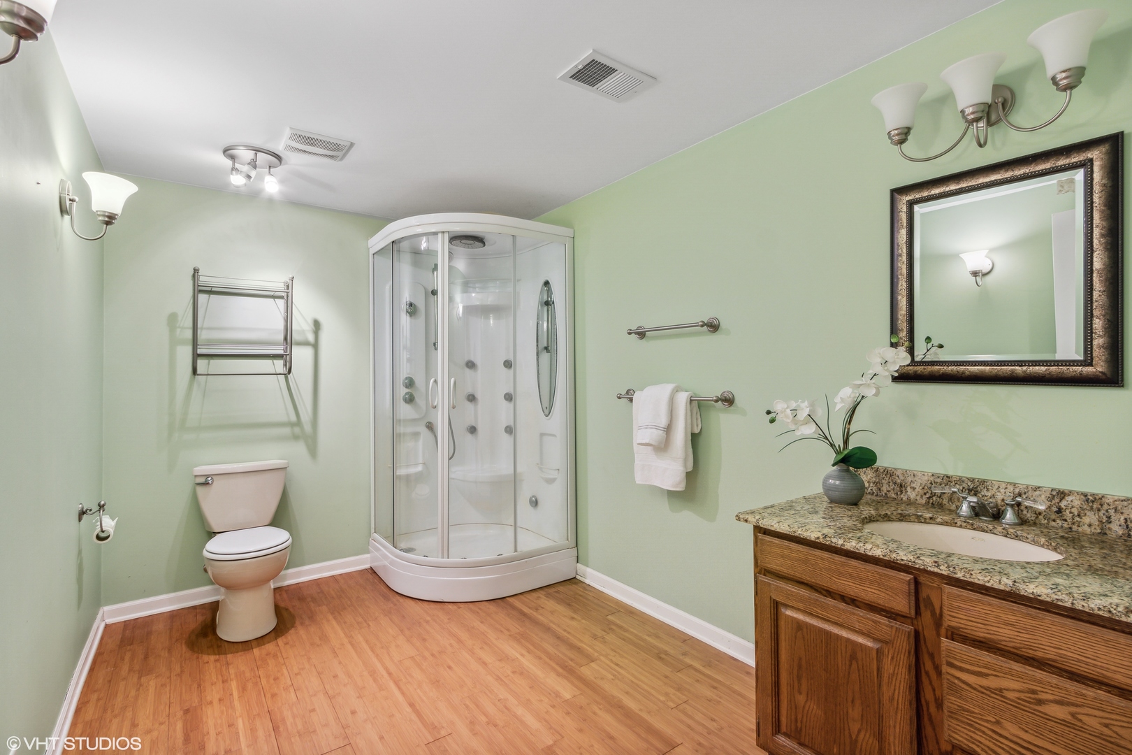 322 Old Sutton Road Barrington, IL 60010 - Photo 23 of 37 a bathroom with a granite countertop sink a toilet and shower