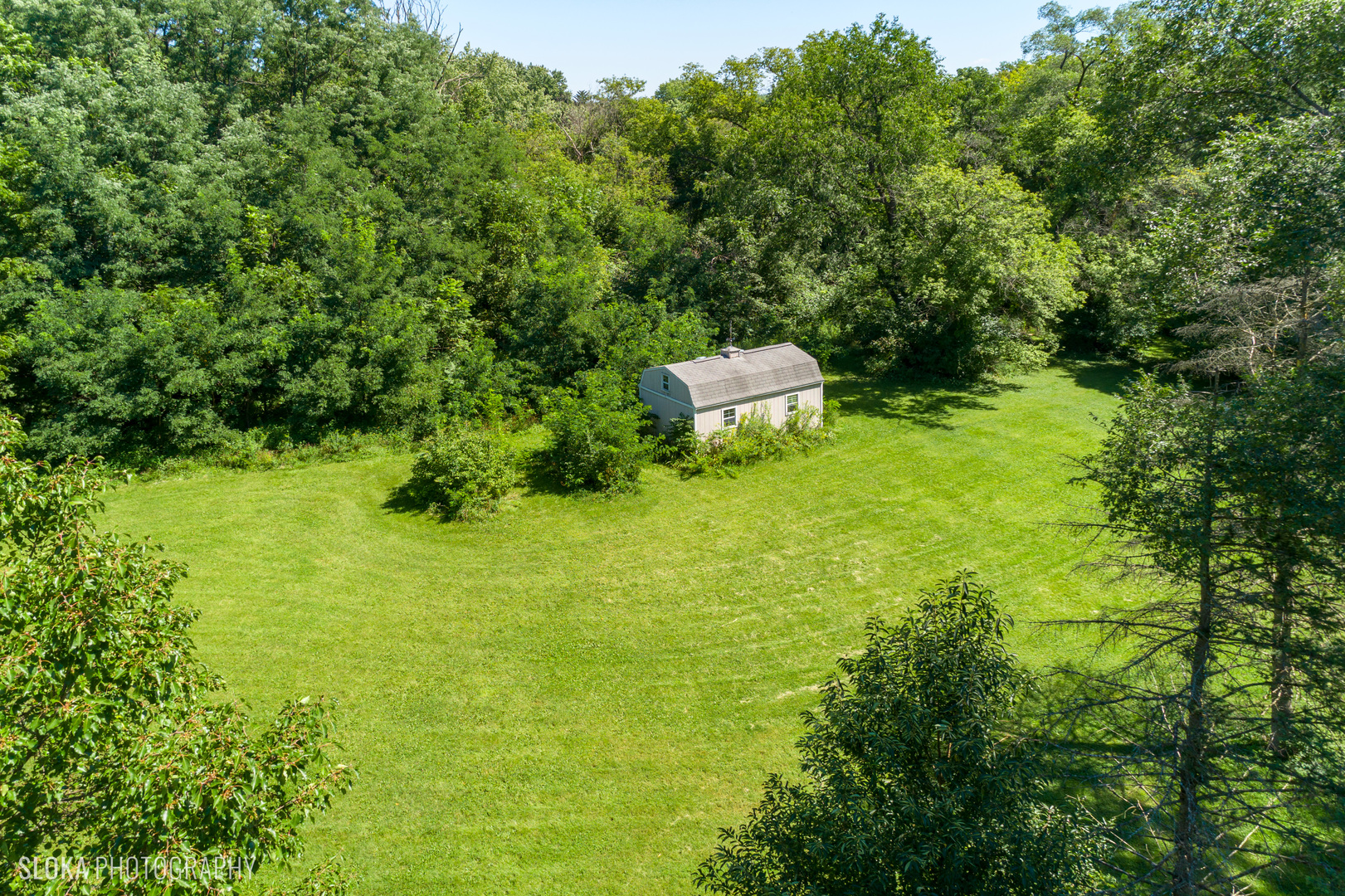 322 Old Sutton Road Barrington, IL 60010 - Photo 26 of 37 a backyard of a house with yard and green space