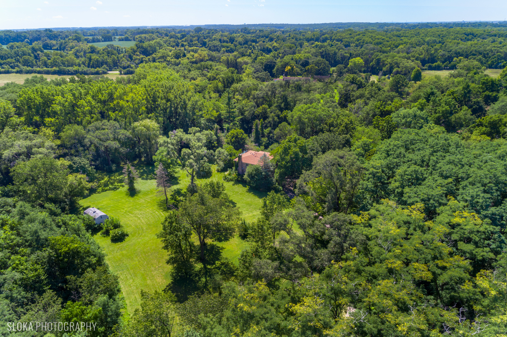 322 Old Sutton Road Barrington, IL 60010 - Photo 28 of 37 a view of a garden with an ocean