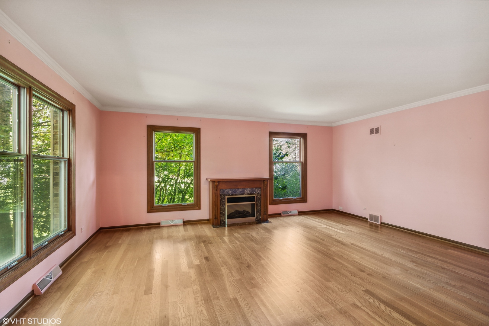 322 Old Sutton Road Barrington, IL 60010 - Photo 7 of 37 a view of empty room with wooden floor and fan