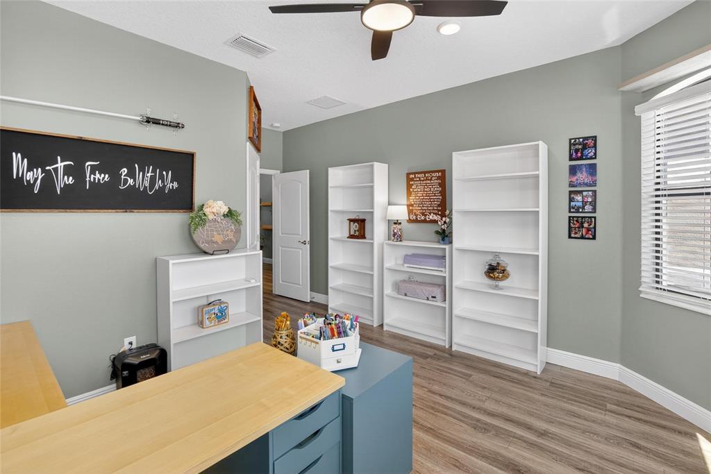 11439 Crowne Pointe Street New Port Richey, FL 34654 - Photo 11 of 50 a room with furniture a washer and dryer