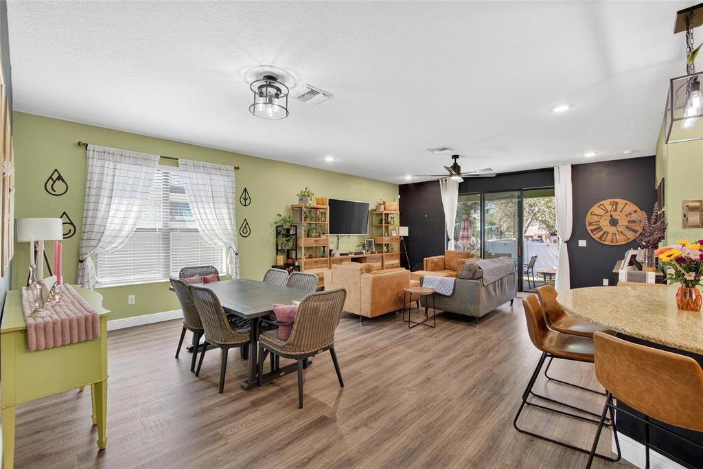 11439 Crowne Pointe Street New Port Richey, FL 34654 - Photo 17 of 50 a living room with furniture and a large window