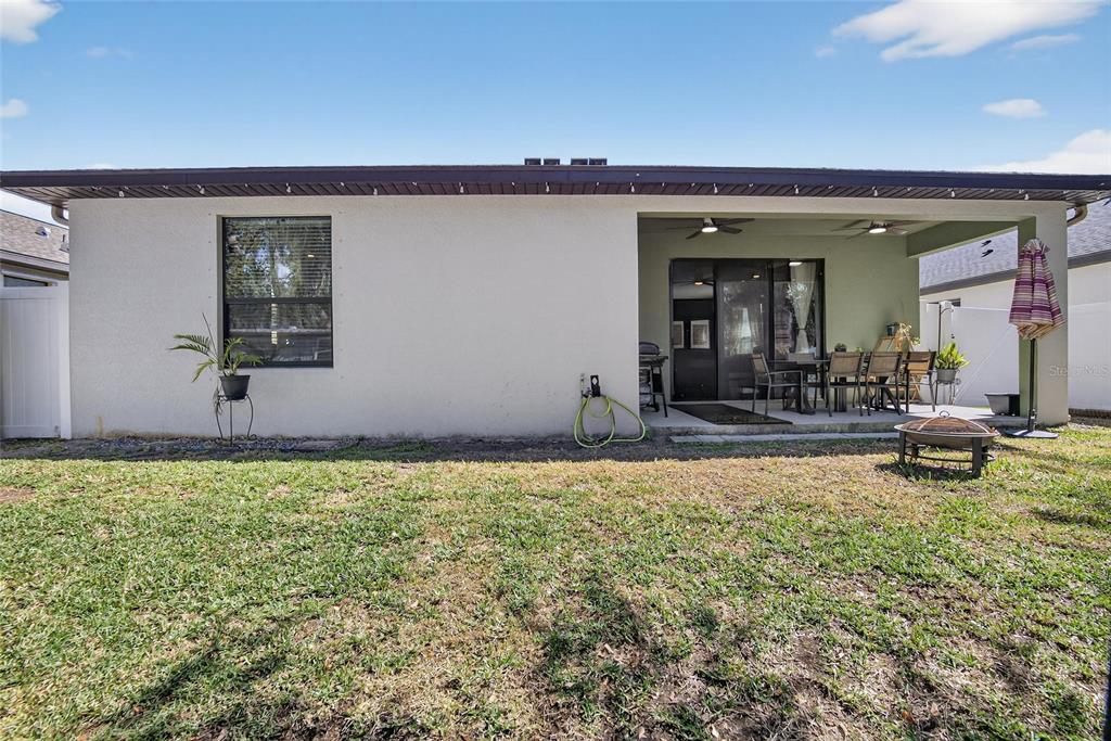 11439 Crowne Pointe Street New Port Richey, FL 34654 - Photo 41 of 50 a living room with furniture