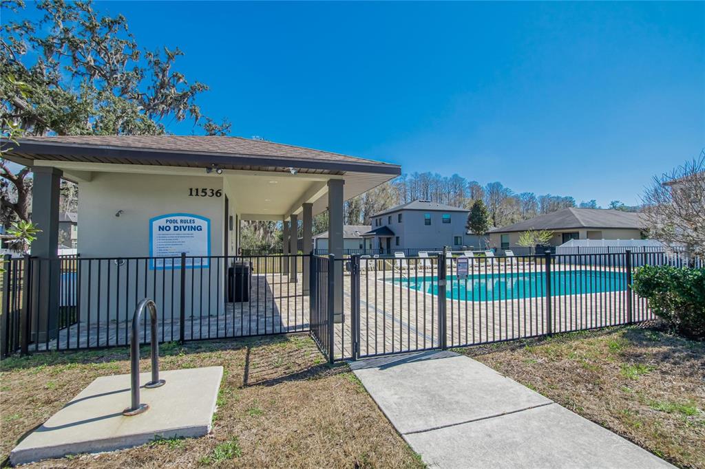 11439 Crowne Pointe Street New Port Richey, FL 34654 - Photo 44 of 50 a view of a wrought iron fences in front of house
