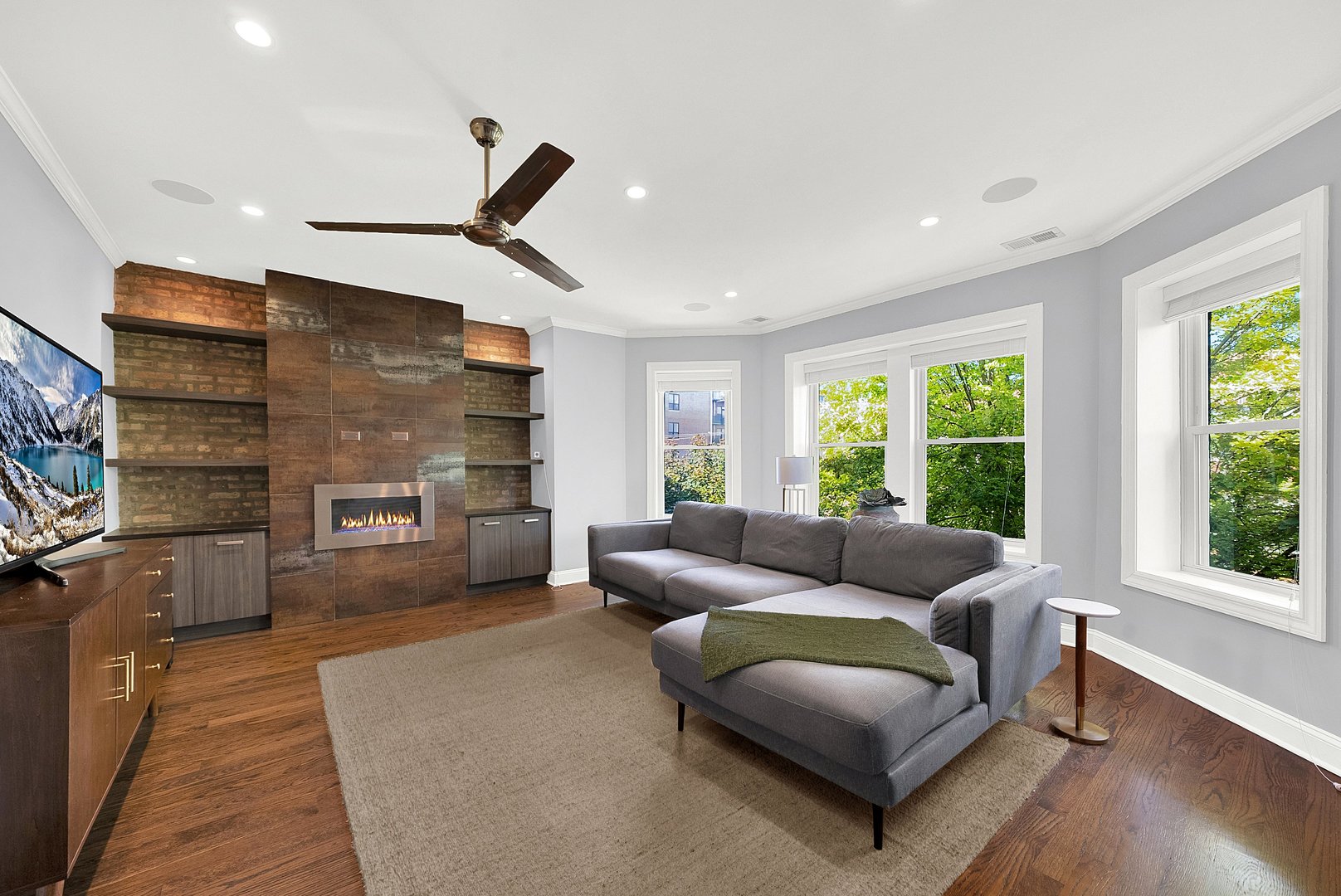 Undisclosed Address Chicago, IL 60647 - Photo 2 of 10 a living room with furniture and a large window