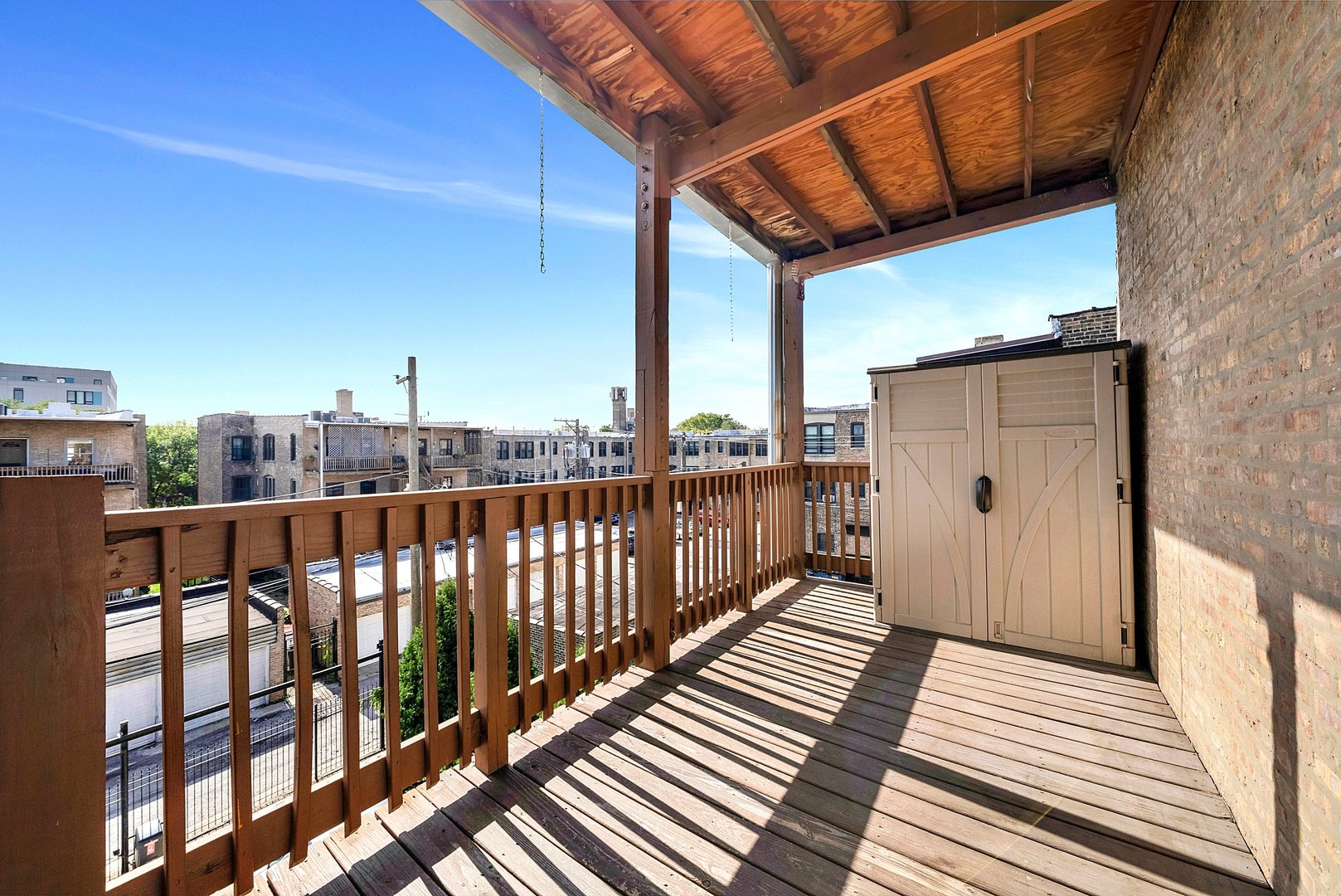 Undisclosed Address Chicago, IL 60647 - Photo 10 of 10 a view of a balcony with wooden floor