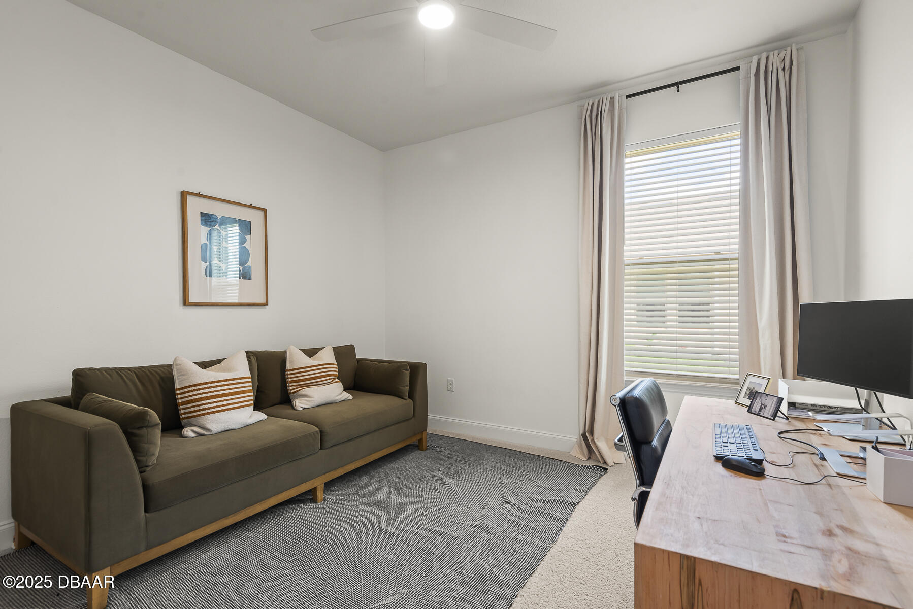 2853 Monaghan Drive Ormond Beach, FL 32174 - Photo 20 of 47 a living room with furniture and a flat screen tv
