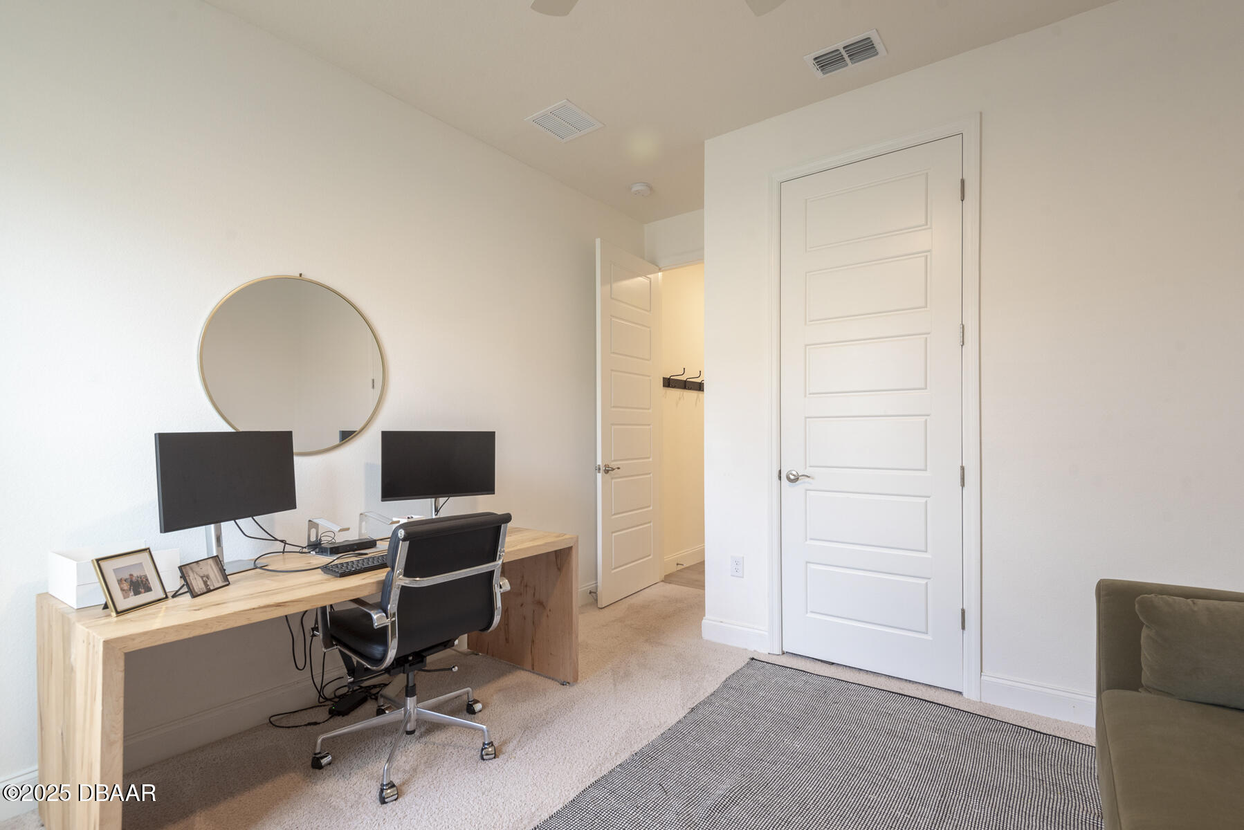 2853 Monaghan Drive Ormond Beach, FL 32174 - Photo 21 of 47 a view of a workspace with furniture and a window