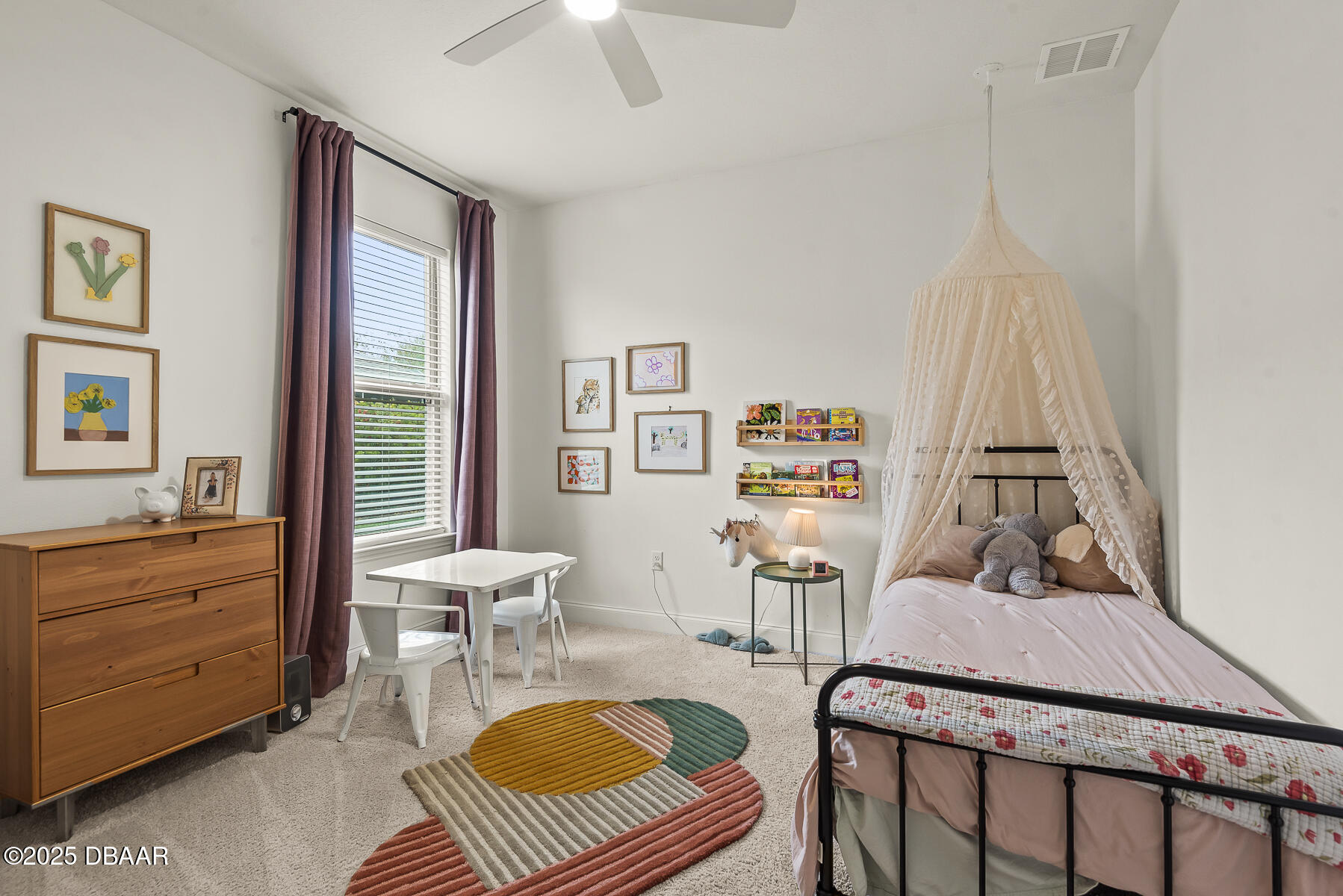 2853 Monaghan Drive Ormond Beach, FL 32174 - Photo 26 of 47 a living room with furniture a rug and a chandelier