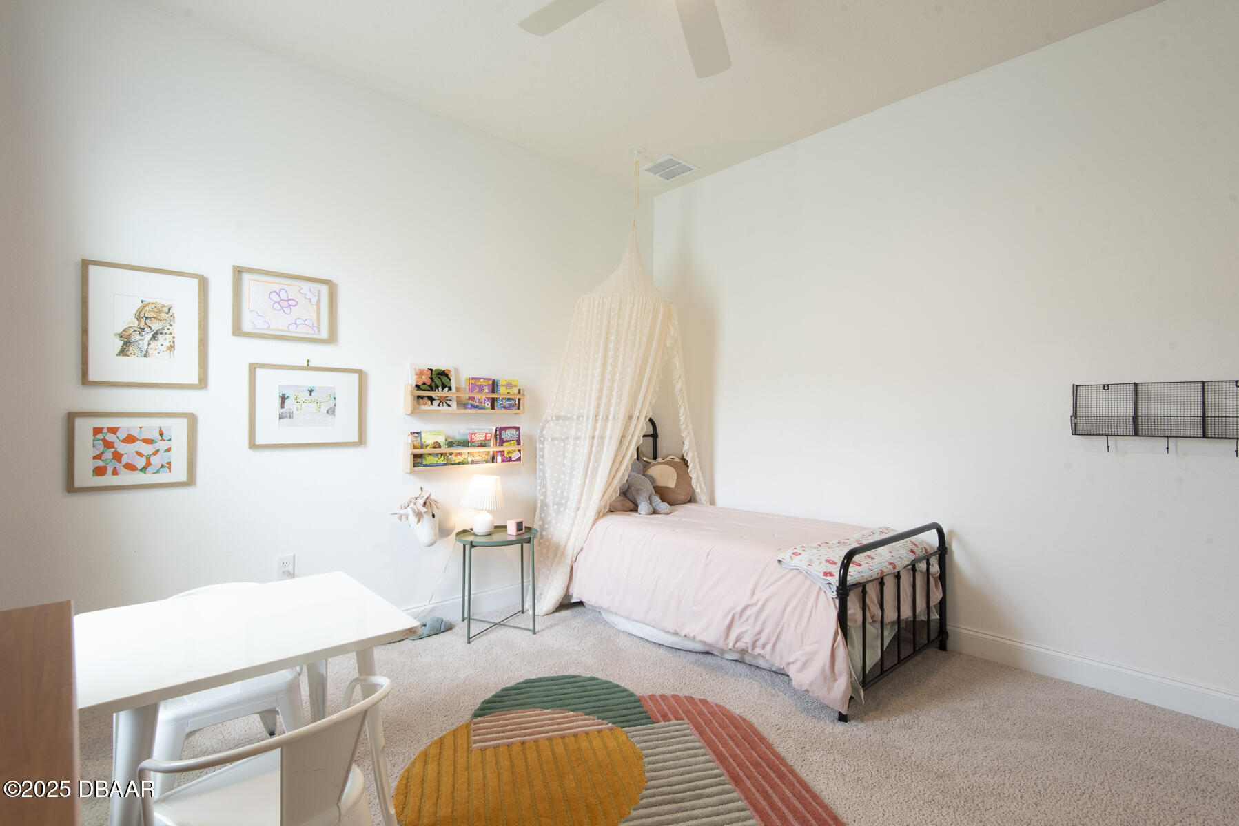 2853 Monaghan Drive Ormond Beach, FL 32174 - Photo 27 of 47 a bedroom with a bed and wooden floor