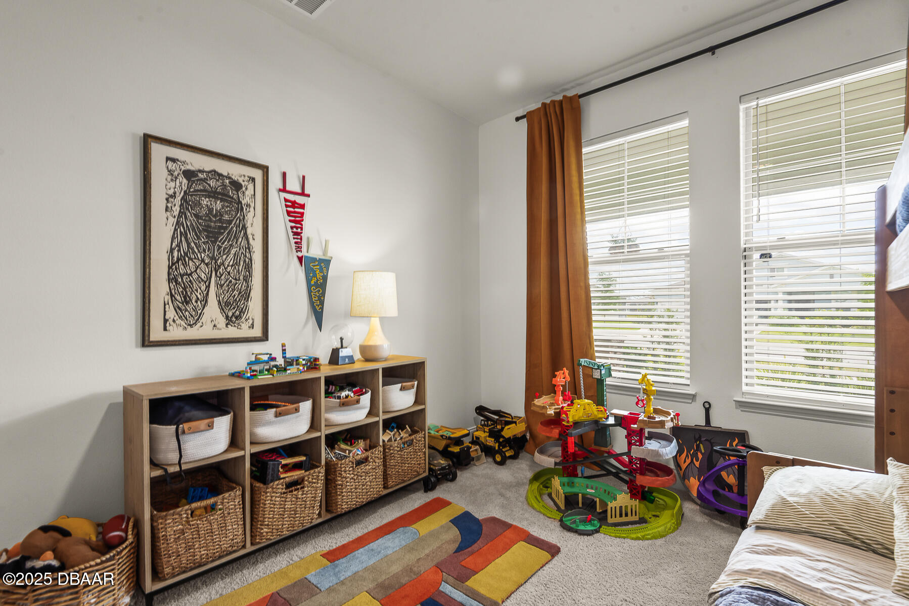 2853 Monaghan Drive Ormond Beach, FL 32174 - Photo 31 of 47 a living room with furniture toys and a window