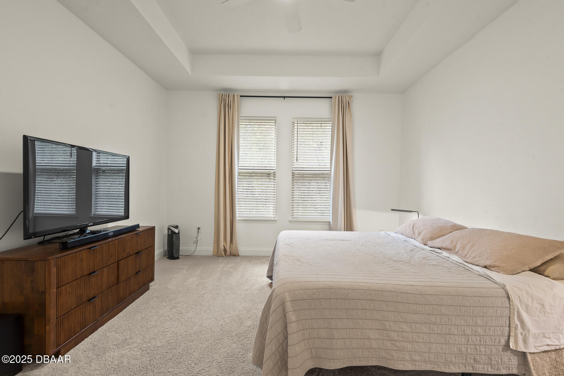 2853 Monaghan Drive Ormond Beach, FL 32174 - Photo 34 of 47 a bedroom with a bed and a flat screen tv