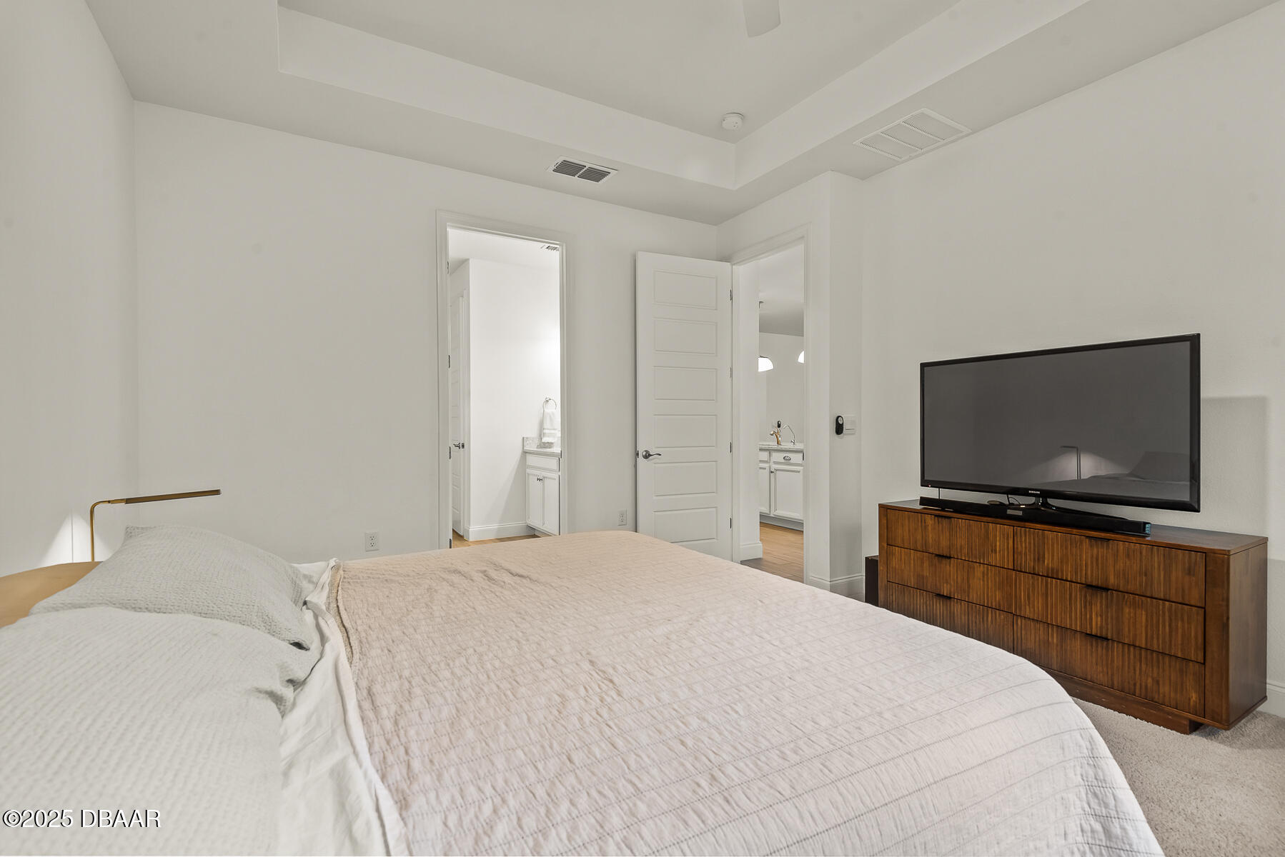 2853 Monaghan Drive Ormond Beach, FL 32174 - Photo 36 of 47 a bedroom with a bed and a flat screen tv