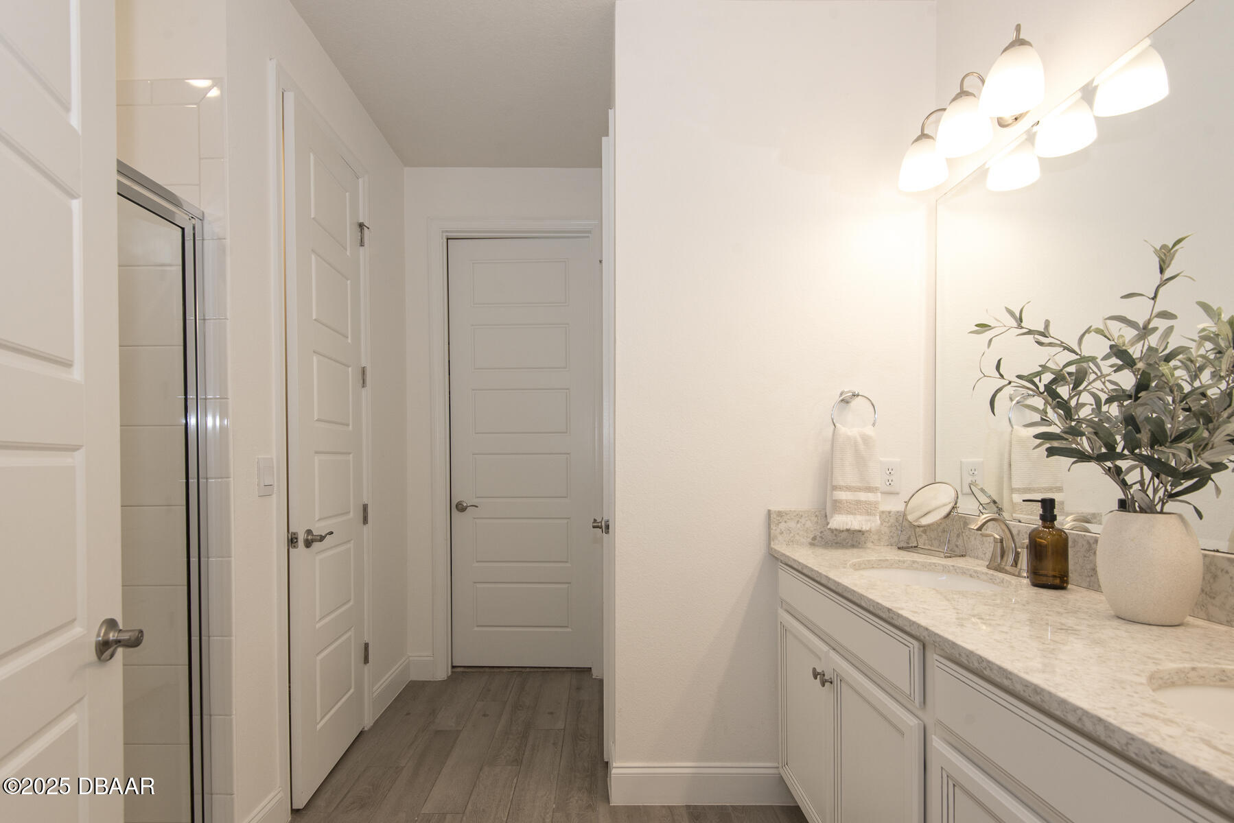 2853 Monaghan Drive Ormond Beach, FL 32174 - Photo 37 of 47 a bathroom with a sink and a mirror