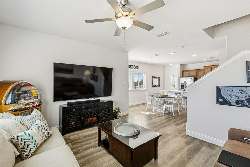 3236 Patrick Street Wylie, TX 75098 - Photo 12 of 35 a living room with furniture and a flat screen tv