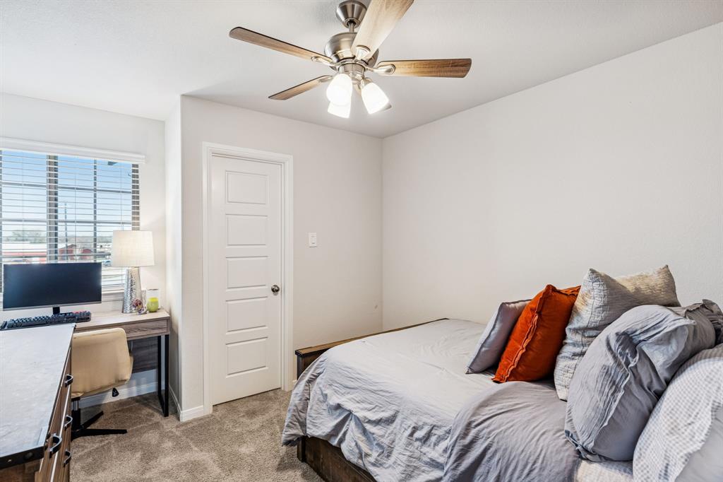 3236 Patrick Street Wylie, TX 75098 - Photo 22 of 35 a bedroom with a bed and a window