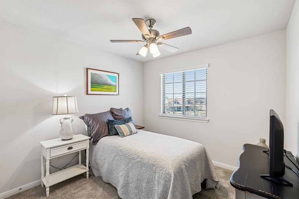3236 Patrick Street Wylie, TX 75098 - Photo 24 of 35 a bedroom with bed and window
