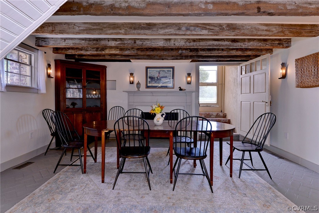 2459 Dunbrooke Road Tappahannock, VA 22560 - Photo 23 of 49 a view of a dining room with furniture and window