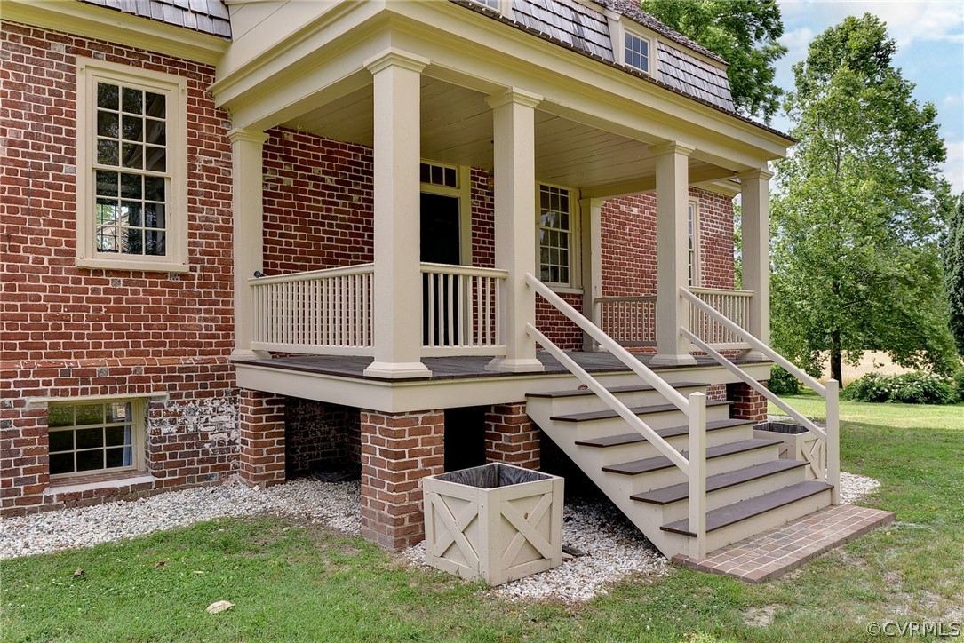 2459 Dunbrooke Road Tappahannock, VA 22560 - Photo 37 of 49 a front view of a house with a yard