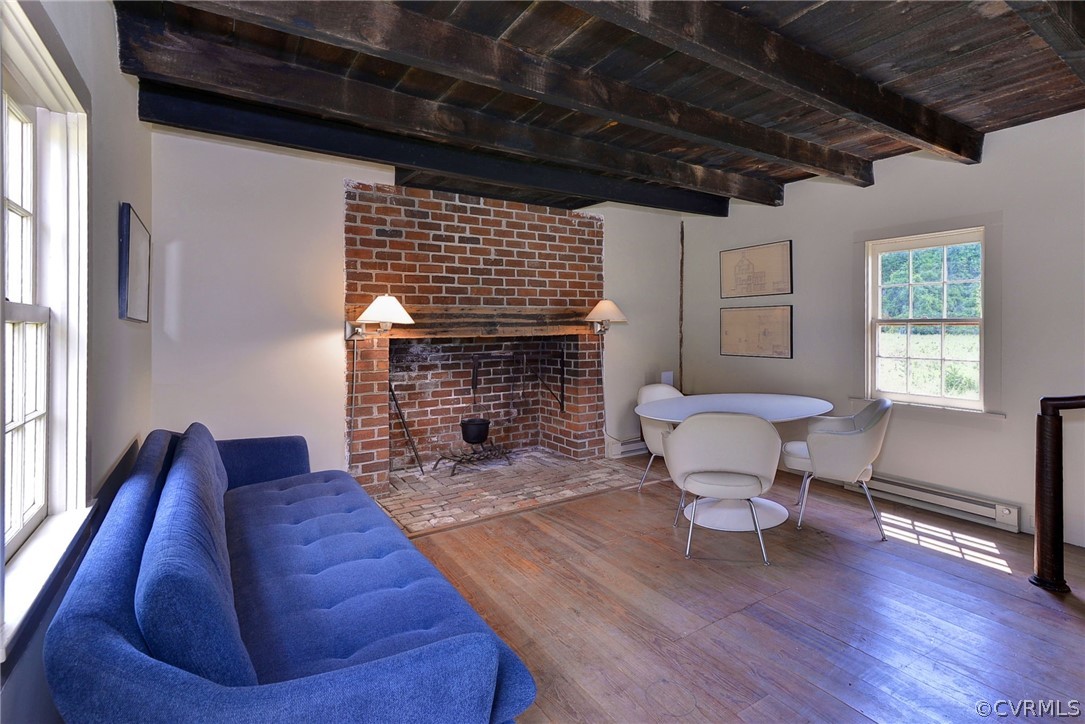 2459 Dunbrooke Road Tappahannock, VA 22560 - Photo 42 of 49 a living room with furniture fireplace and window