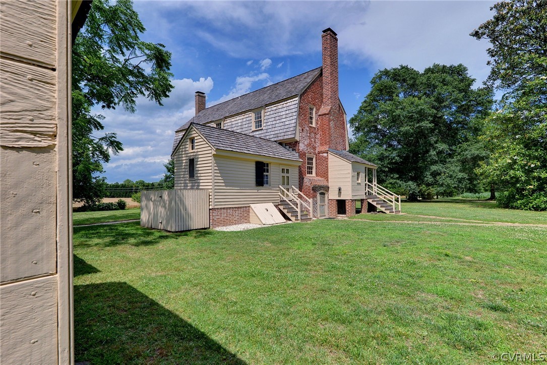 2459 Dunbrooke Road Tappahannock, VA 22560 - Photo 43 of 49 a view of a house with a big yard and large tree