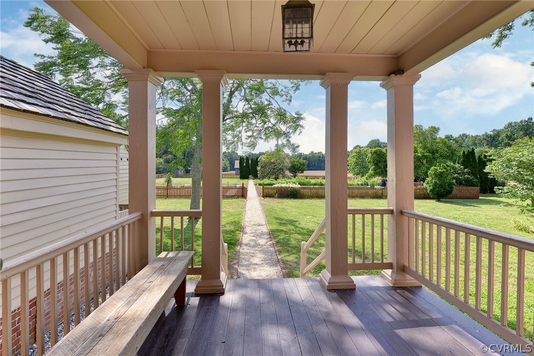 2459 Dunbrooke Road Tappahannock, VA 22560 - Photo 6 of 49 a view of a porch with wooden floor