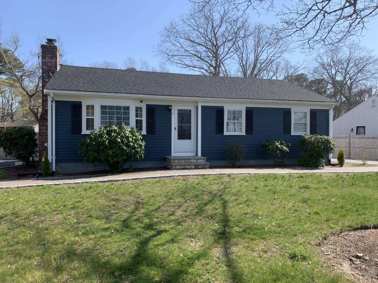 5 Alicia Road Hyannis, MA 02601 - Photo 1 of 12 a front view of house with yard and green space
