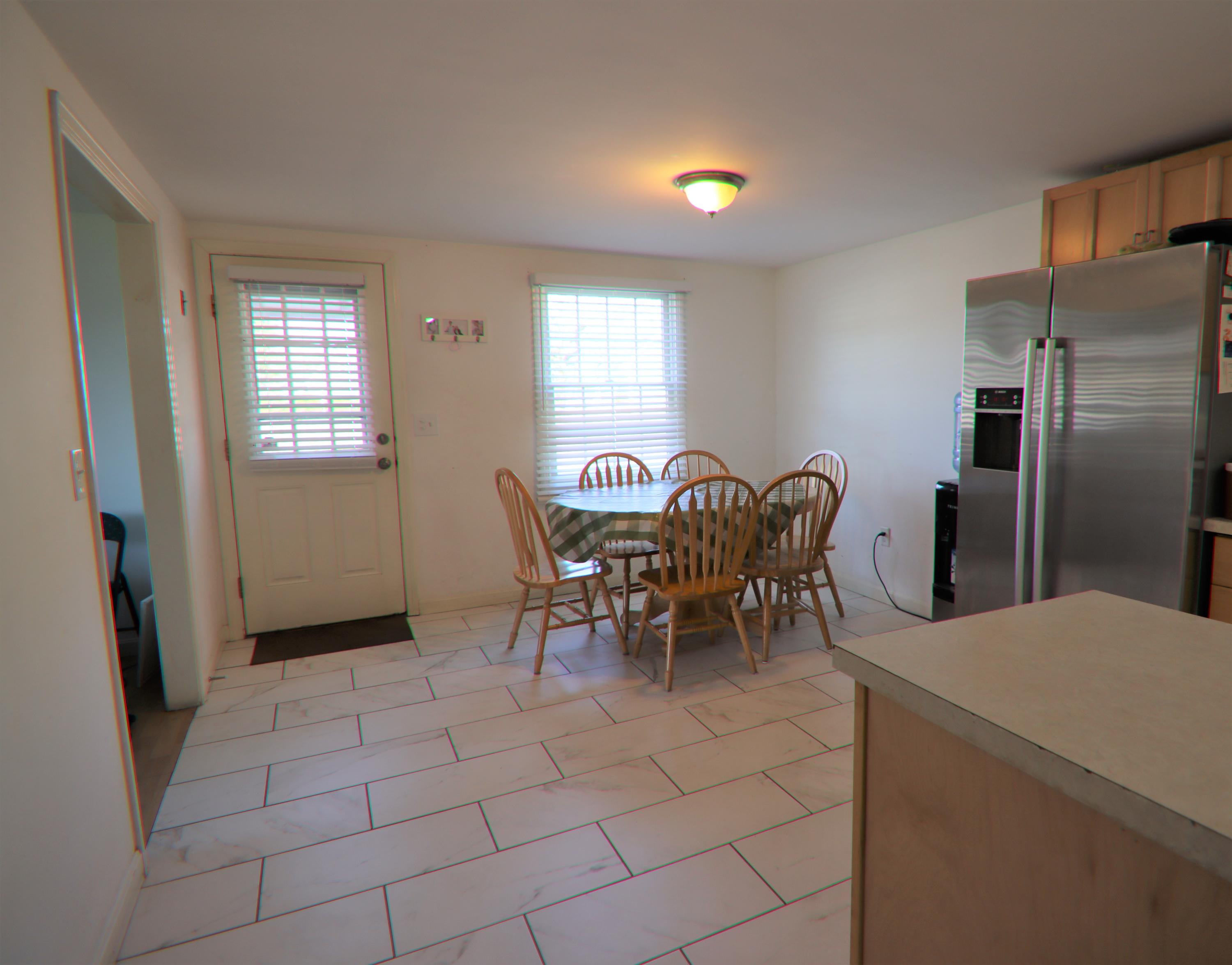5 Alicia Road Hyannis, MA 02601 - Photo 3 of 12 a view of a dining room with furniture and window