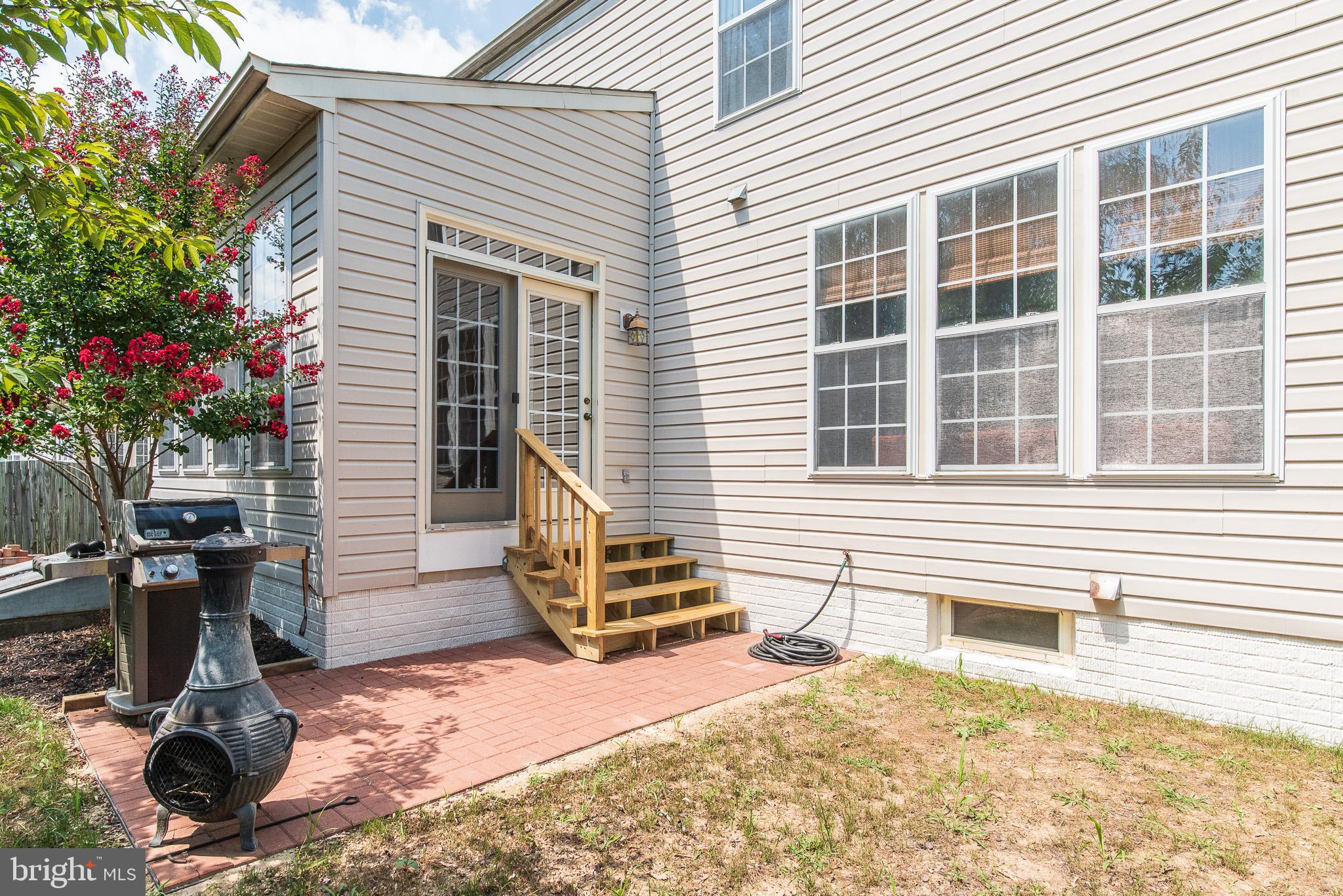 415 Spry Island Road Joppa, MD 21085 - Photo 8 of 49 Rear patio and Stairs from Sunroom