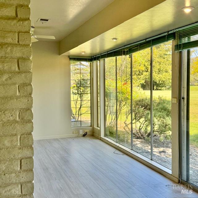 12 Glengreen Street Santa Rosa, CA 95409 - Photo 8 of 11 a view of an empty room with wooden floor and a window