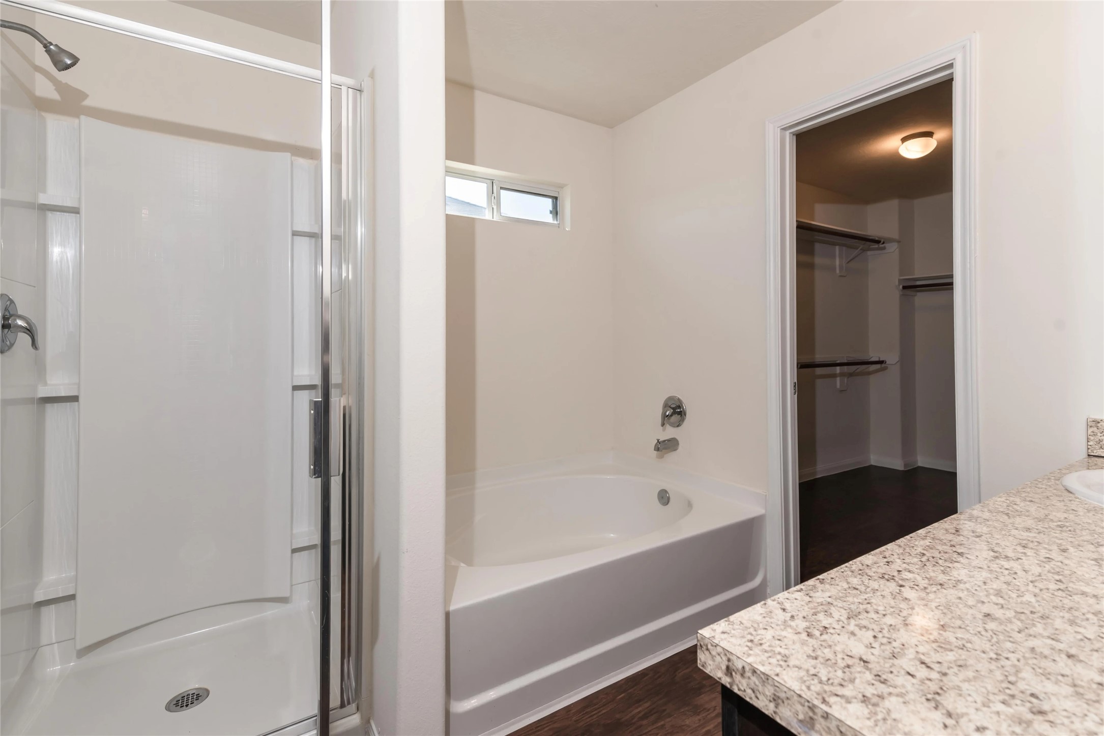 21835 North Werrington Way Houston, TX 77073 - Photo 9 of 10 a bathroom with a bathtub and a shower