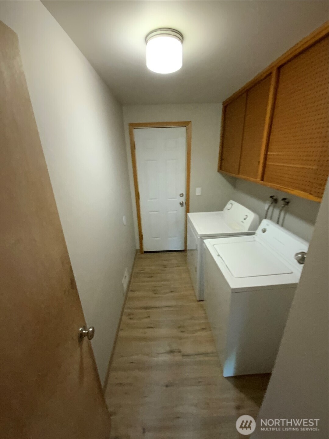 621 Brookdale Road East Tacoma, WA 98445 - Photo 14 of 14 a bathroom with a sink a toilet and a mirror