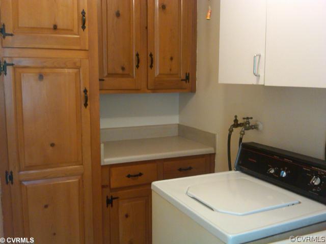 21500 Genito Road Moseley, VA 23120 - Photo 5 of 11 a room with storage and utility