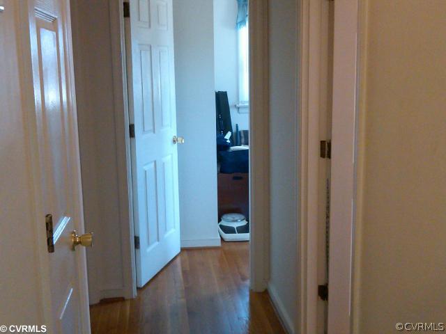 21500 Genito Road Moseley, VA 23120 - Photo 6 of 11 a view of a hallway with wooden floor