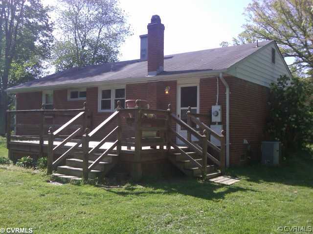 21500 Genito Road Moseley, VA 23120 - Photo 7 of 11 a front view of a house with a yard