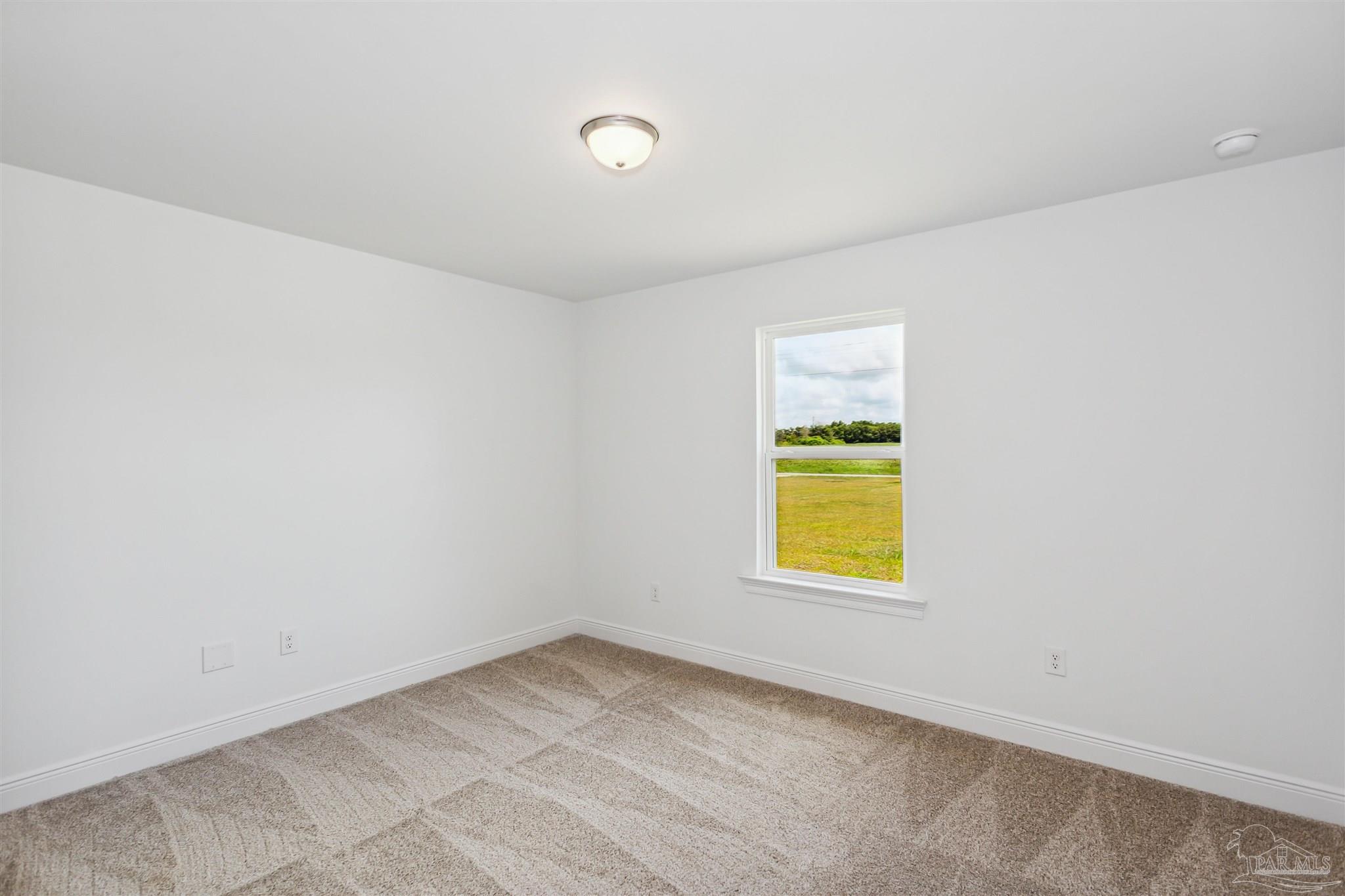 9319 Salter Road Pace, FL 32571 - Photo 15 of 32 an empty room with a window