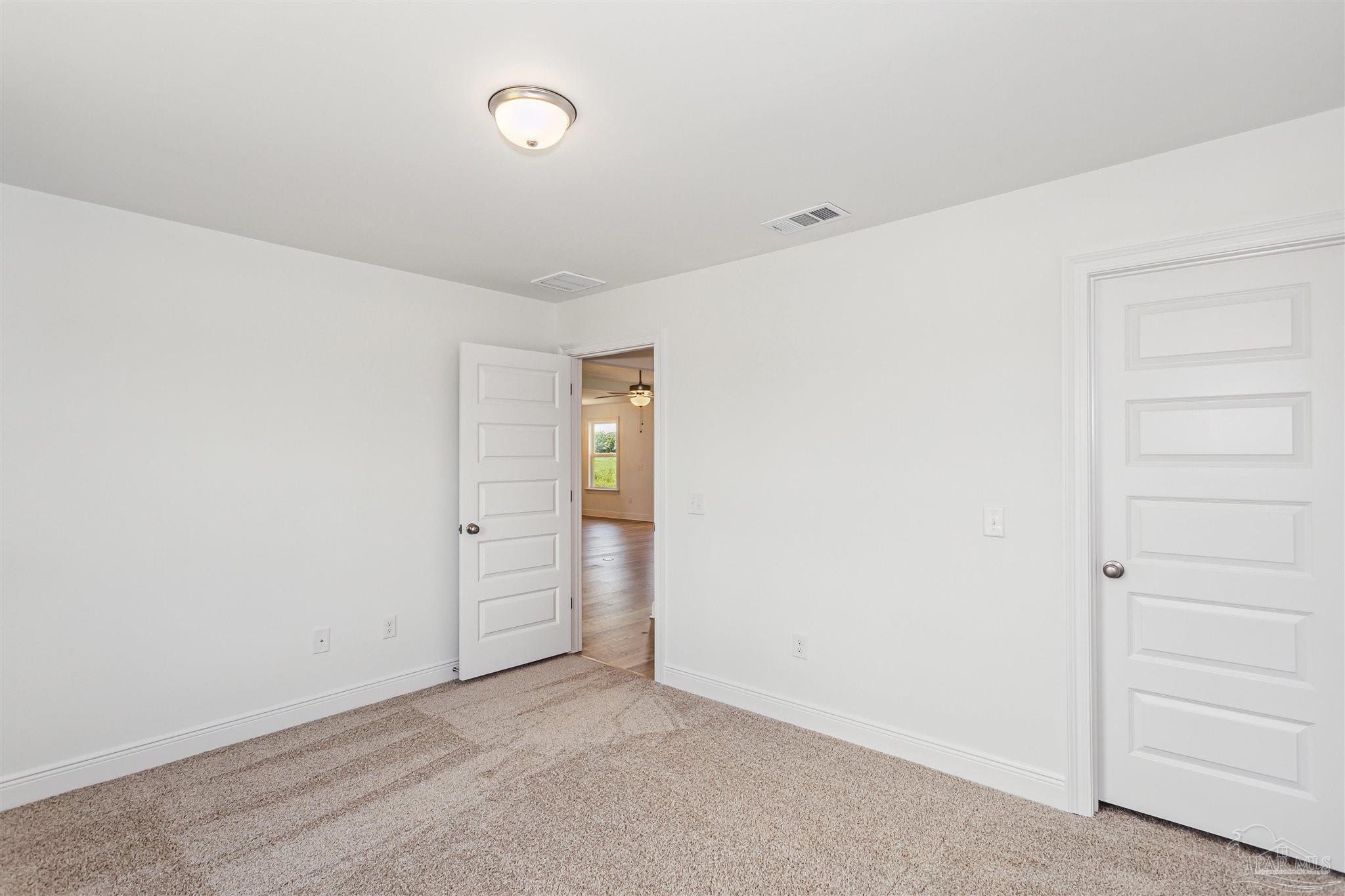 9319 Salter Road Pace, FL 32571 - Photo 16 of 32 a view of an empty room